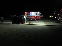 Ambulance at a car accident scene during the middle of the night