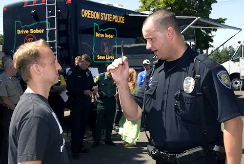 Oregon State Policeman performing a DUI test
