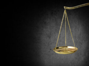 Legal scale with a grey and black background